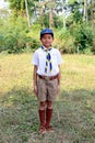 Thai boy wears the boyscout uniform.